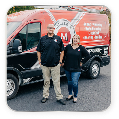 people in front of a work van